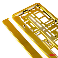 Nummerpladeramme med snapliste i guldfarvet metallic