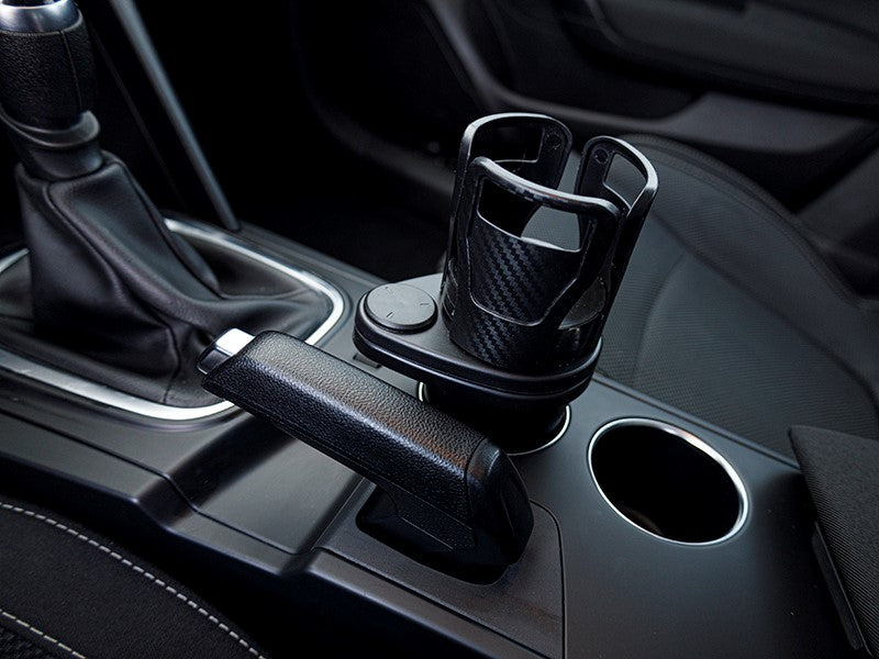 Ruimtebesparende bekerhouder voor de standaard opening in de autoconsole